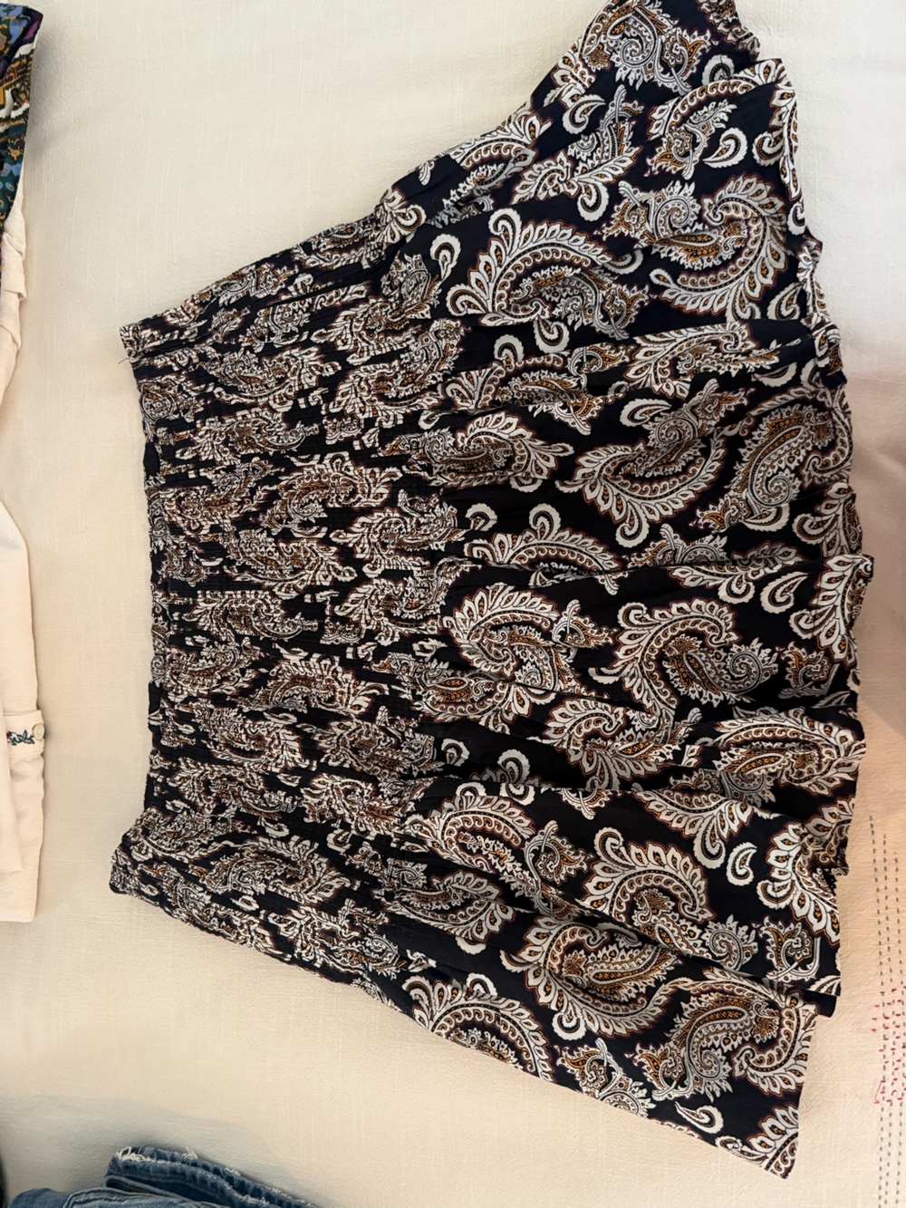 Anthropologie Black Paisley Smocked Mini Skirt with Cream & Brown Accents